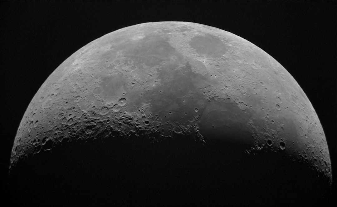 Ancient Peaks on Pluto's Largest Moon Hint at Rapid Early Rotation - Space Portal featured image
